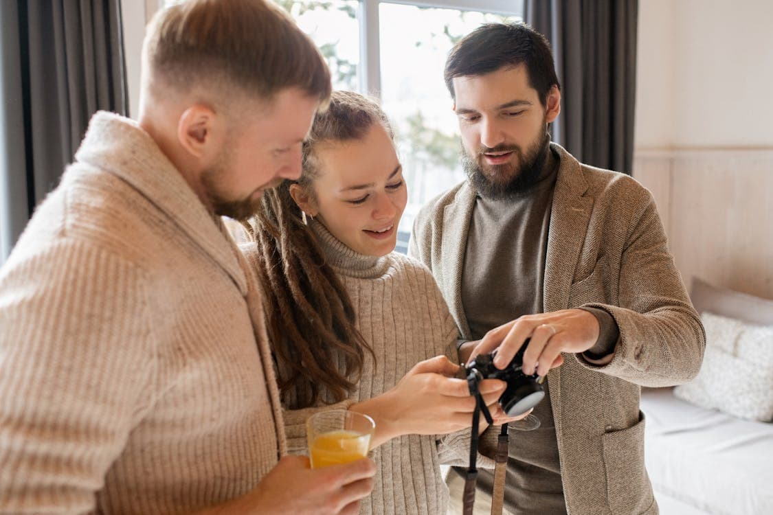 Family watching live TV together through an IPTV subscription in the USA